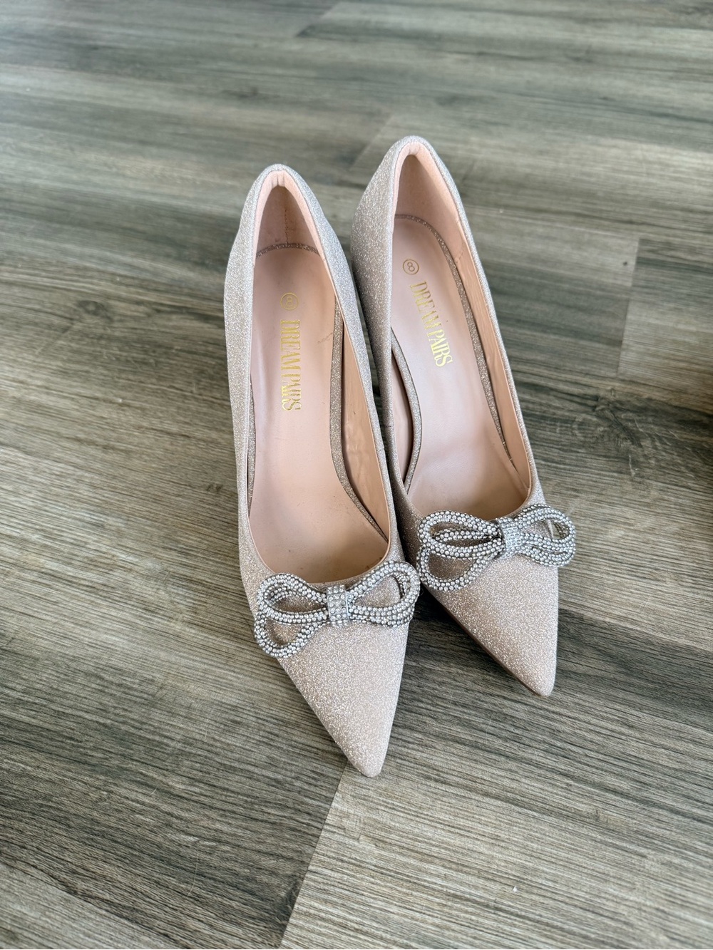Dream Pairs Glitter Pointed-Toe Pumps with Crystal Bow in Blush
